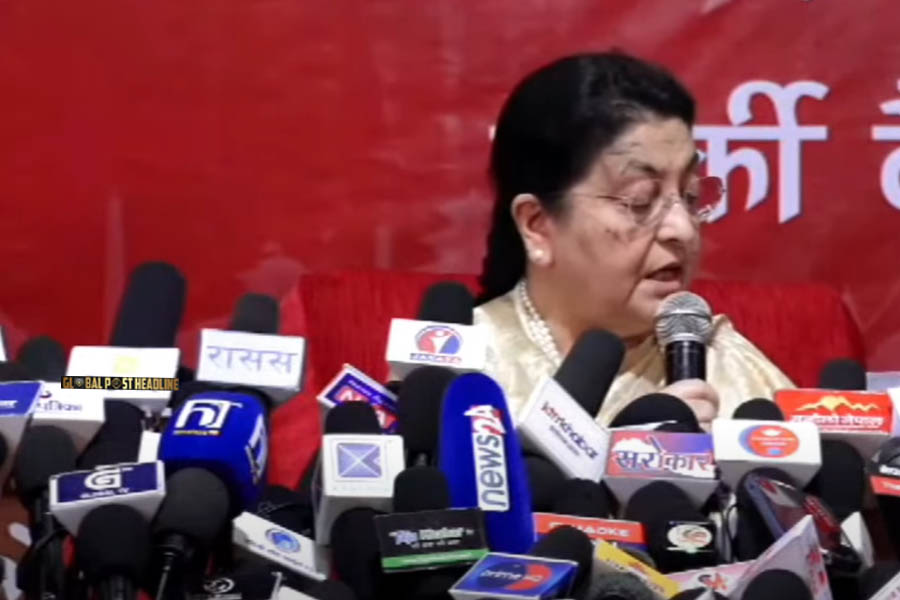 Former President Bidya Devi Bhandari addresses a press conference in Kathmandu, asserting her constitutional right to retain CPN-UML party membership and continue her political journey.