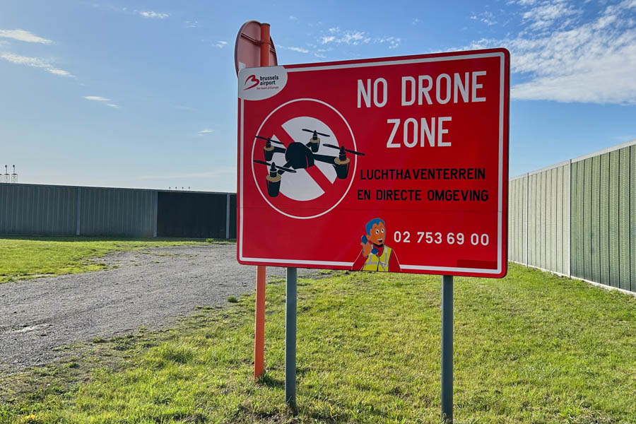 Police and security officials patrol Brussels Airport after drone incursions grounded flights and raised national security concerns in Belgium.