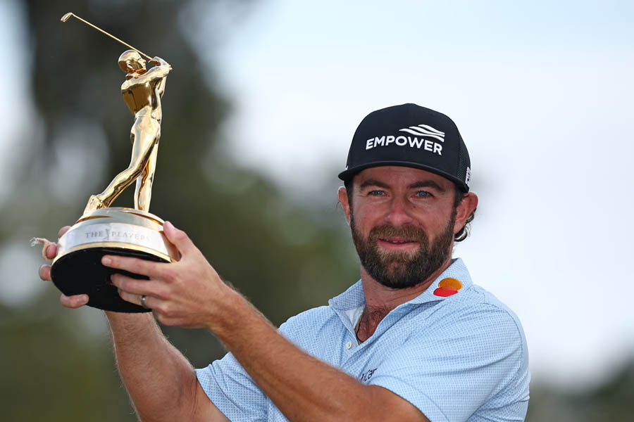 Cameron Young winning Players Championship 2026 trophy at TPC Sawgrass with 13 under par