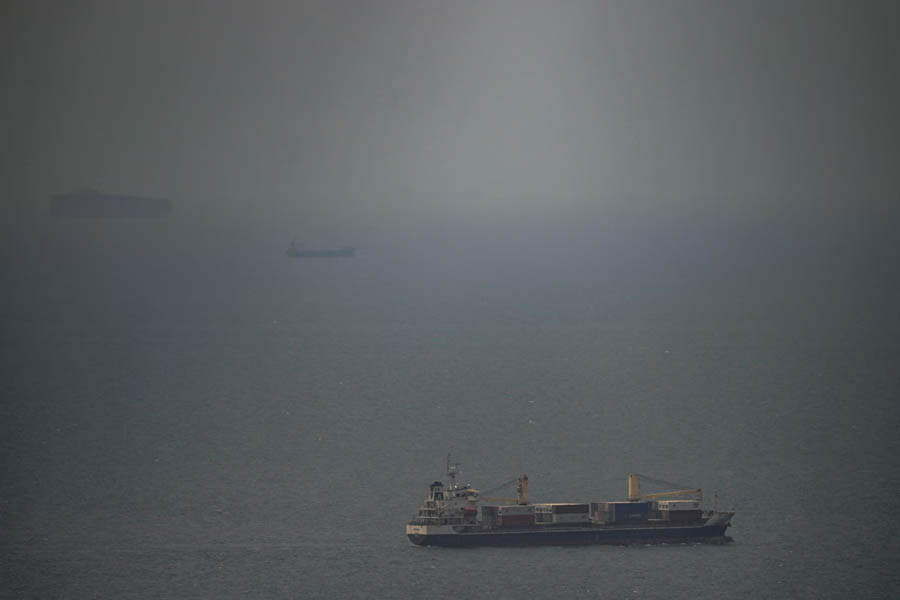 Cargo ship sailing in the Gulf towards the Strait of Hormuz