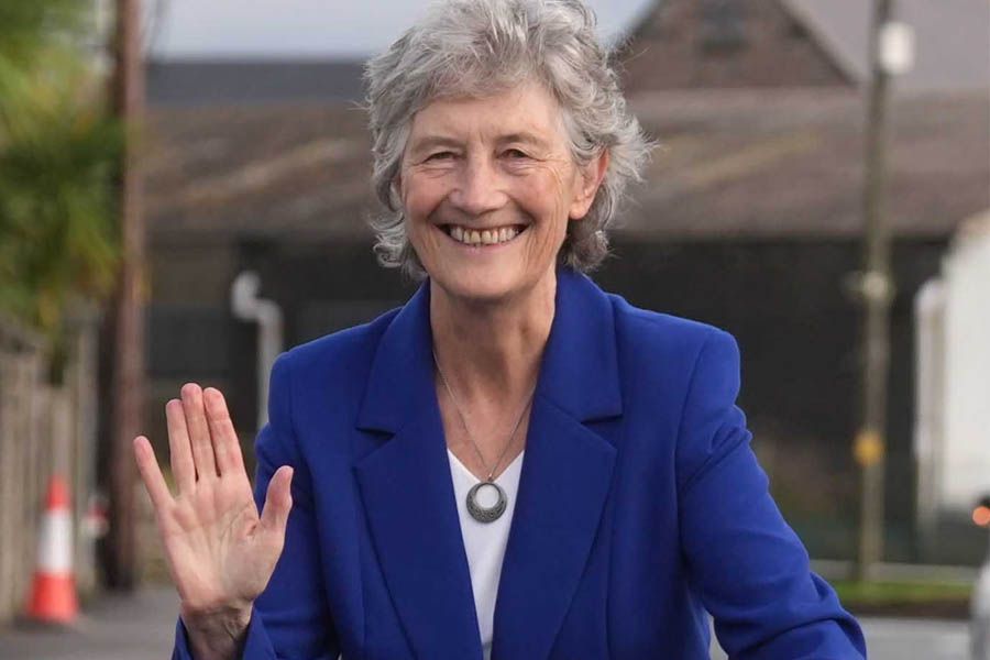 Catherine Connolly waves to supporters at Dublin Castle after being declared Ireland’s next president, following a landslide election victory.