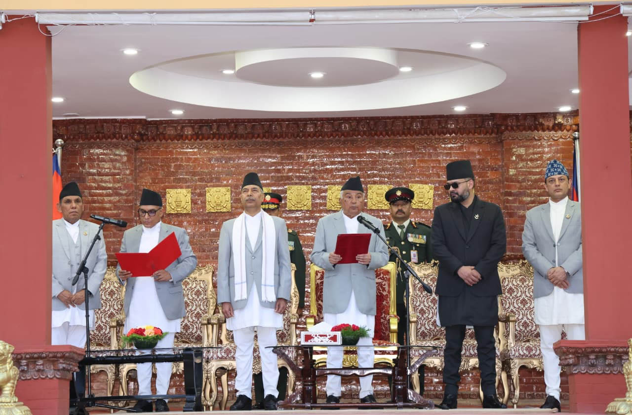President Ramchandra Paudel administers the oath of office to Chief Justice Dr. Manoj Kumar Sharma at Sheetal Niwas, as Prime Minister Balen Shah, Speaker Dol Prasad Aryal, and senior government officials look on during the solemn swearing-in ceremony.