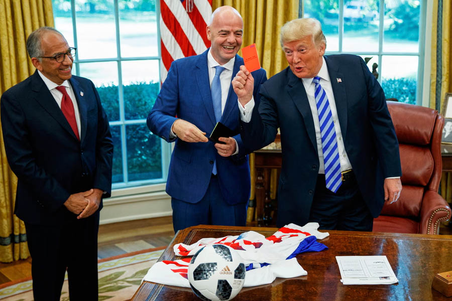 Carlos Cordeiro (left) with Donald Trump and Gianni Infantino in the Oval Office in 2018.