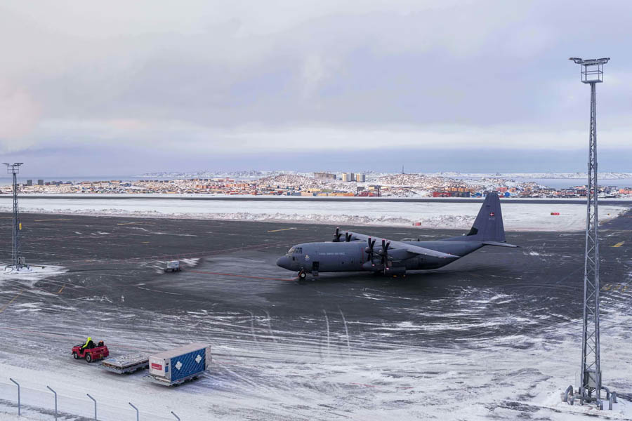 Danish military plane on the runway at Nuuk, Greenland, amid heightened NATO focus on Arctic defence and regional security.