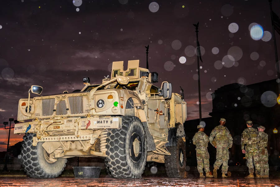Members of the District of Columbia National Guard stand beside their M-ATV outside Union Station in Washington, D.C., Sunday, Aug. 17, 2025.