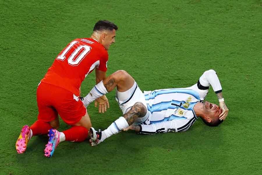 De Paul reacts after being fouled by Switzerland's Granit Xhaka
