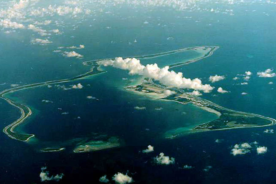 Aerial view of Diego Garcia island in the Chagos Archipelago, showing the US-UK military base and surrounding waters.