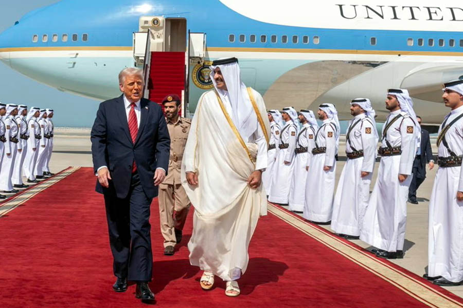 Donald Trump has hit back at critics over his acceptance of a $400m jet from Qatar, claiming the gift was to the US and not him personally; picture of Donald Trump with Qatar's emir, Sheikh Tamim bin Hamad al-Thani, in Doha on May 14 2025.