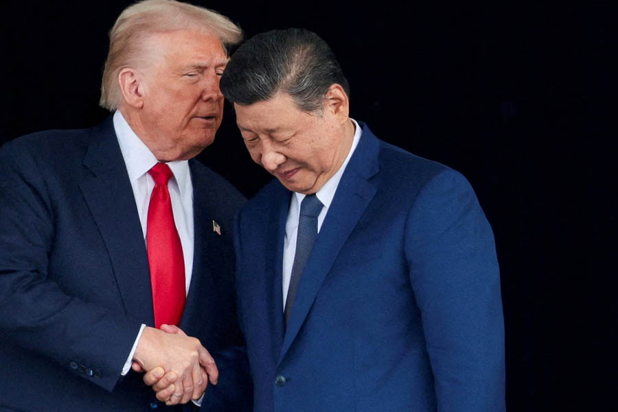 Donald Trump and Xi Jinping speaking together during the Apec summit in October.