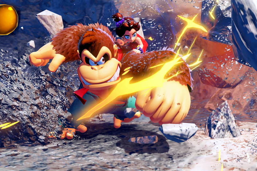 Donkey Kong unleashes his Bananza form with Pauline on his shoulder, smashing through the underground world in a rhythm-charged rampage on Nintendo Switch 2.