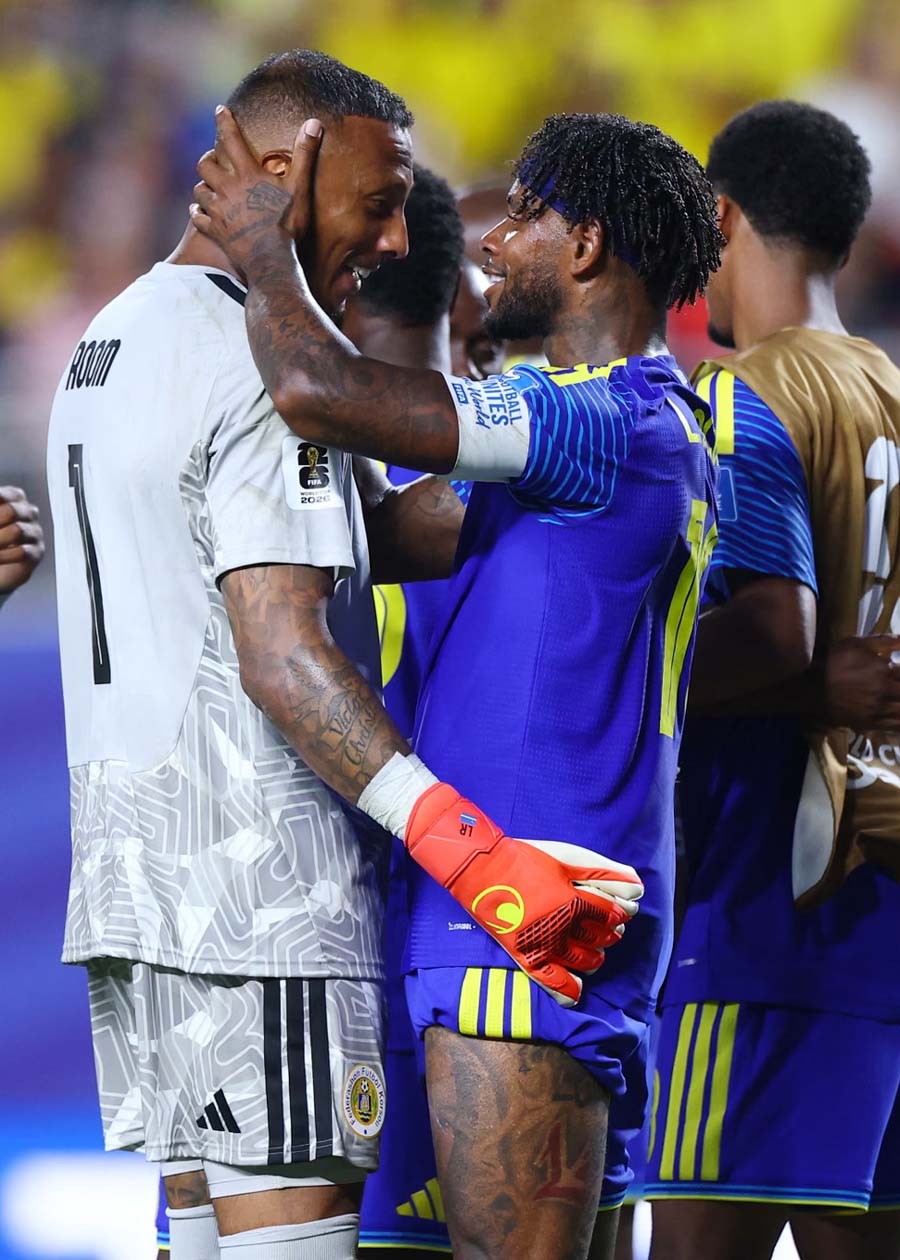 Eloy Room celebrates after the final whistle with his record-breaking 15-save performance