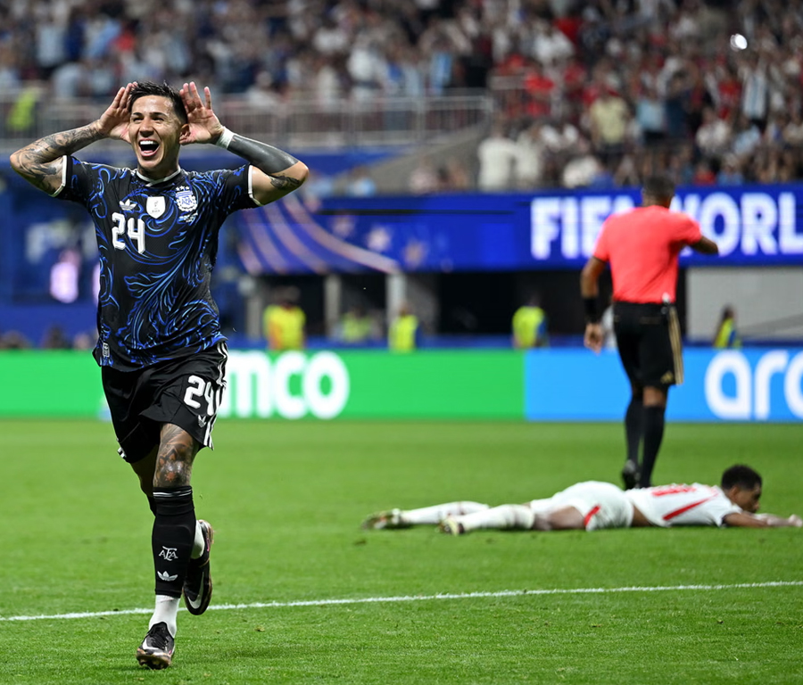 Enzo Fernández celebrates after his equaliser for Argentina against England