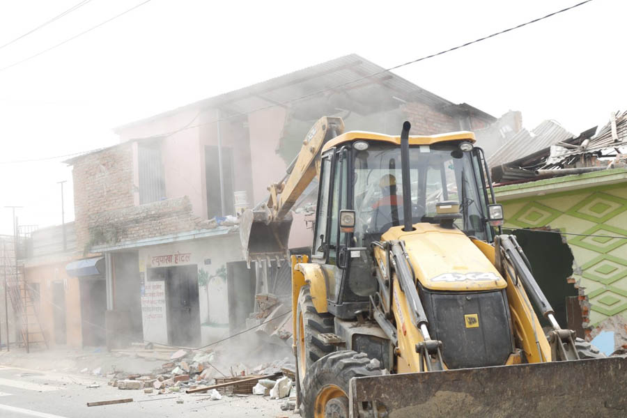 Security personnel clearing Gairigaun squatter settlement