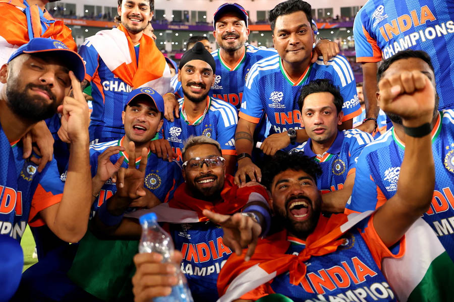 India players celebrating T20 World Cup 2026 victory at Narendra Modi Stadium after defeating New Zealand in the final.