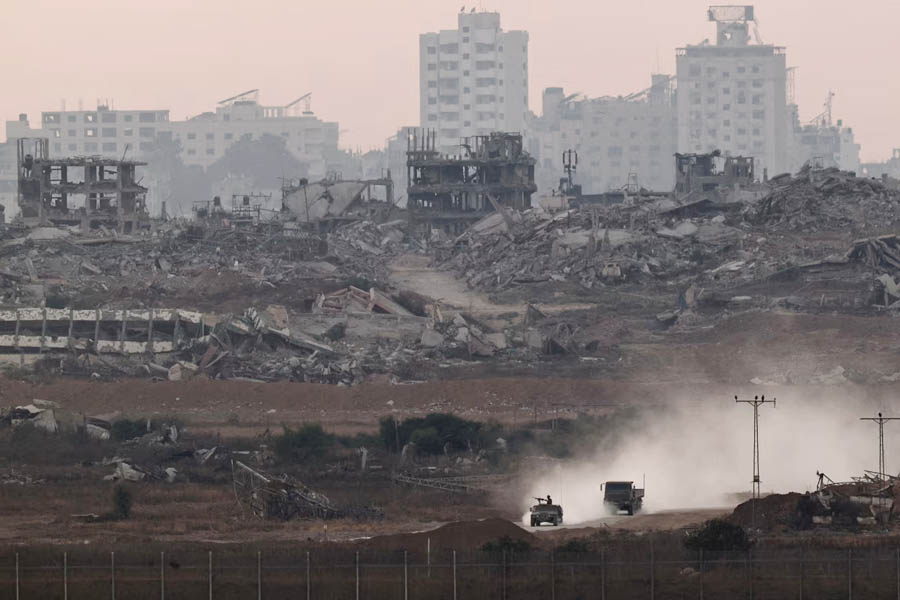 Israeli military vehicles continue operations inside the Gaza Strip, as Donald Trump claims Israel has agreed to ceasefire terms and urges Hamas to accept the deal.