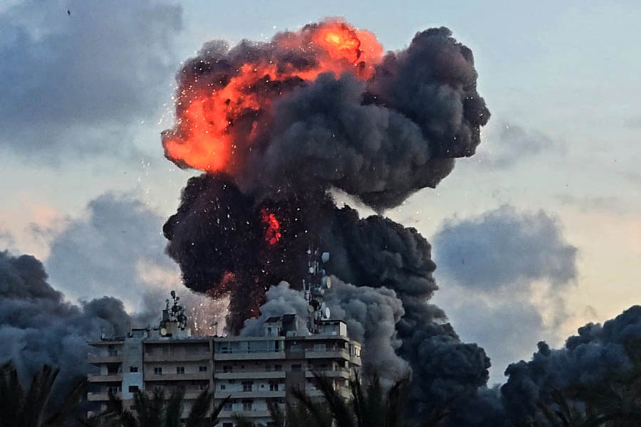 Massive fireball and thick black smoke rising from a building in the ancient Lebanese coastal city of Tyre following an Israeli airstrike.