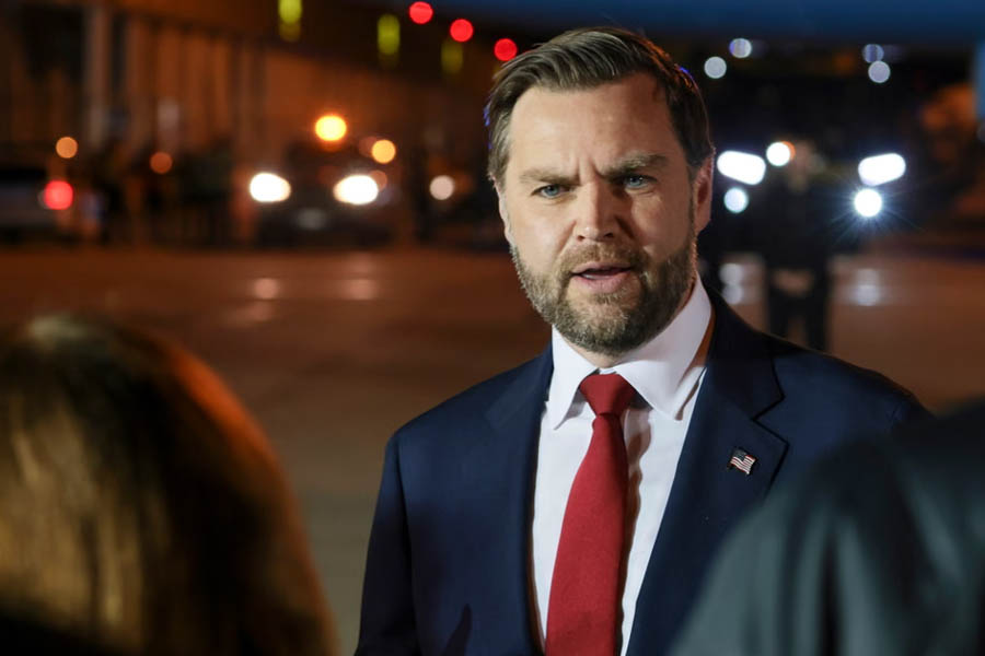 JD Vance speaks to the media before boarding Air Force Two to return to Washington.