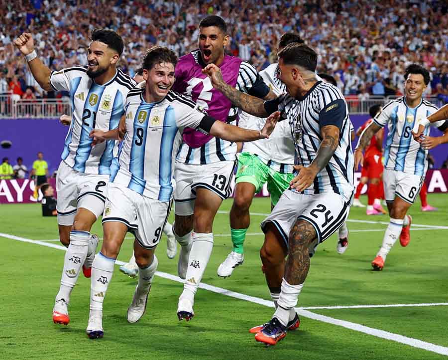 Argentina's Julian Alvarez celebrates scoring their second goal against Switzerland