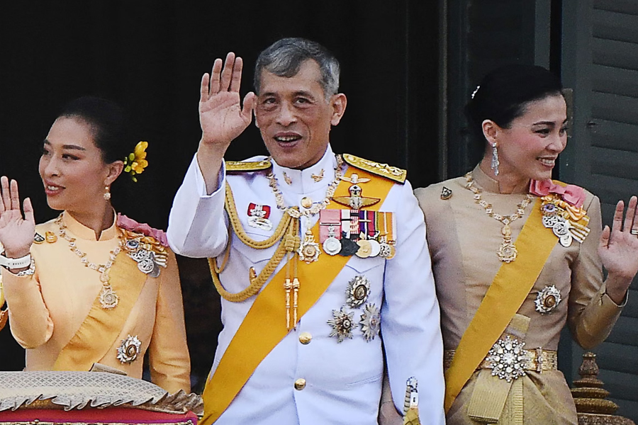 Thailand's King Maha Vajiralongkorn with Princess Bajrakitiyabha Mahidol on the left and Queen Suthida