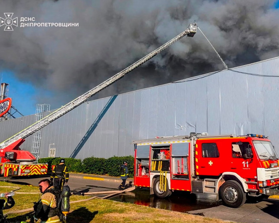 Firefighters work at the site of a shopping centre hit by Russian drones attack in Kryvyi Rih, central Ukraine, killing at least 16 people