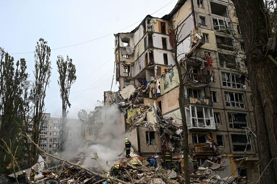 Rescuers clear rubble in Kyiv after Russia’s deadliest airstrike of the year, as EU leaders push for tougher sanctions and stronger air defenses for Ukraine.