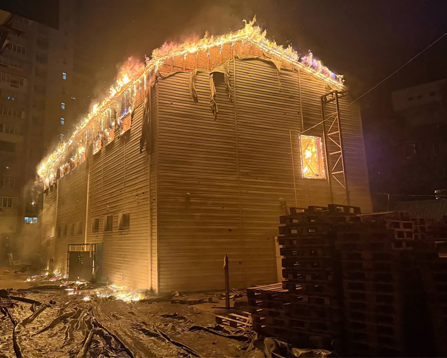 Building on fire at the site of a Russian strike on Kyiv, Ukraine.