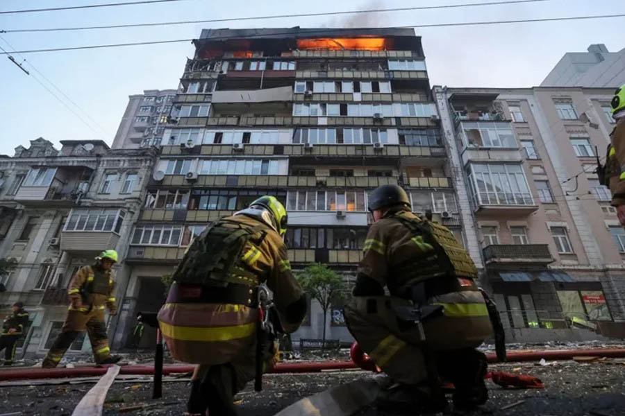 Firefighters respond to the aftermath of a deadly Russian drone and missile strike on a residential block in Kyiv, where 400 drones and 18 missiles were launched overnight.