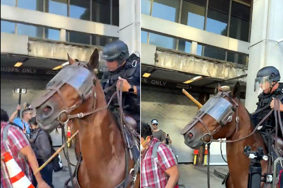 LAPD officers on horseback charge anti-ICE protesters while others shoot munitions. Chaotic scene in downtown LA.
