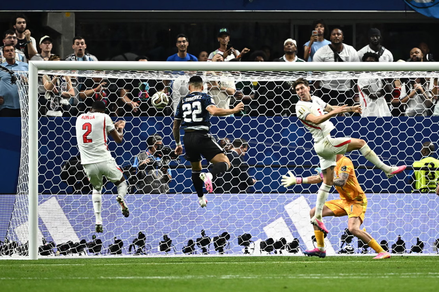 Lautaro Martínez climbs high to nod home Argentina's late winner against England