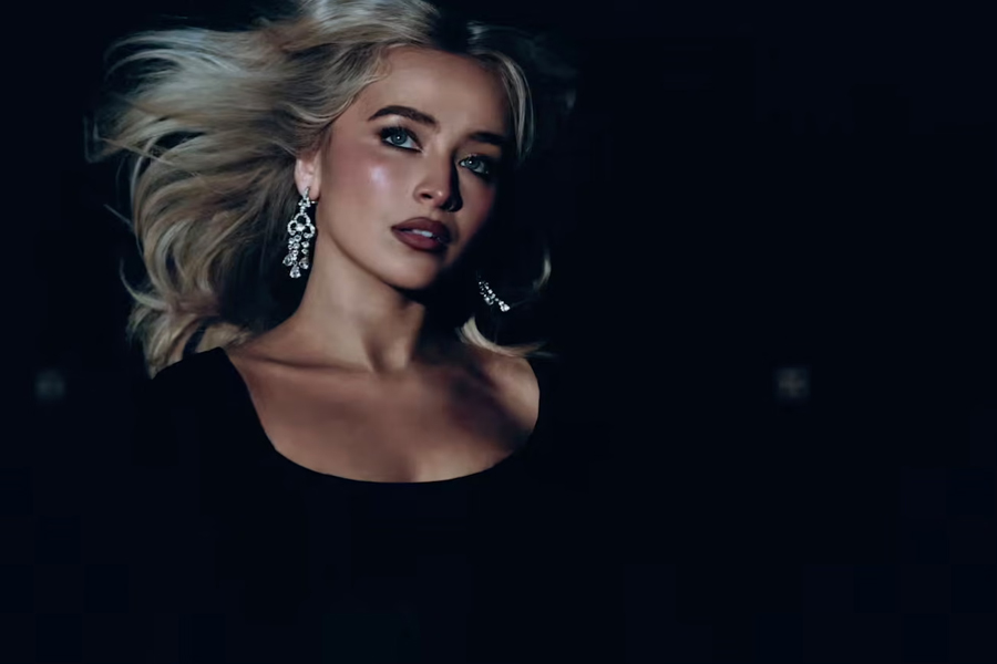 Sabrina Carpenter appears alongside Madonna in the Confessions II video, creating strategic ambiguity between the two performers