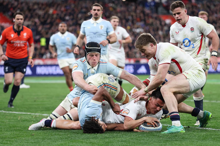 Marcus Smith diving to score England’s sixth try against France during the Six Nations rugby match