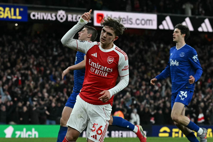 Max Dowman celebrating after scoring for Arsenal and becoming the youngest goal scorer in Premier League history at the Emirates Stadium.