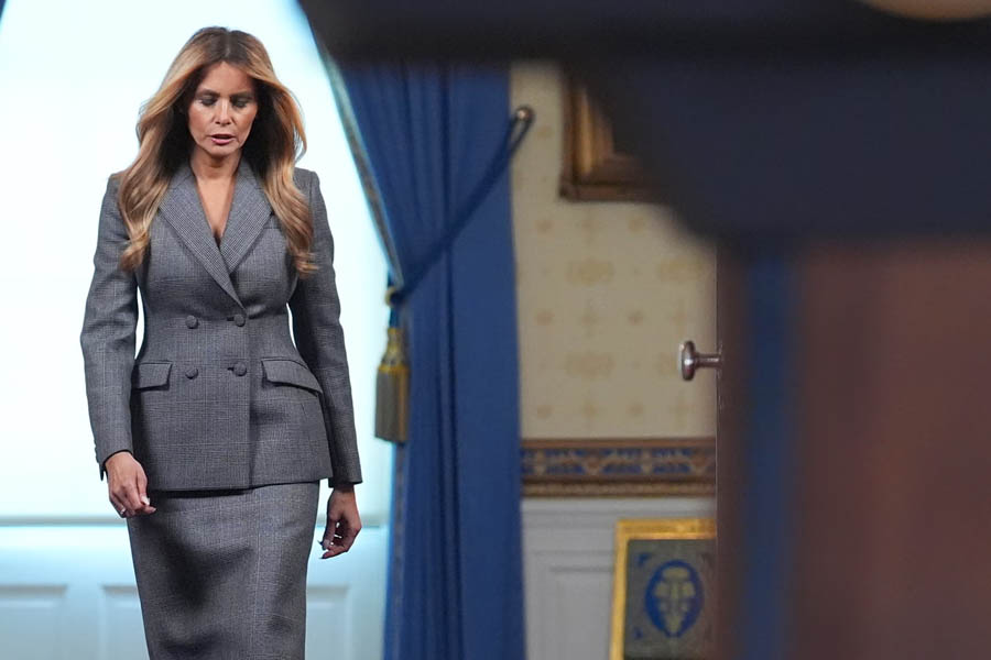 Melania Trump arrives to speak with reporters in the grand foyer of the White House on April 9, 2026.