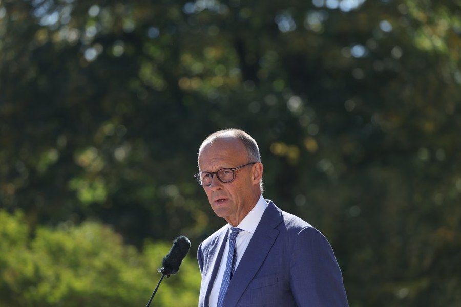 German chancellor Friedrich Merz speaks to the media at the start of a two-day cabinet retreat.
