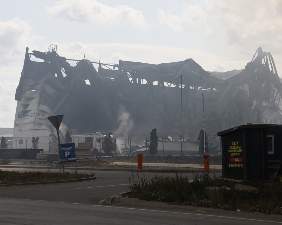Firefighters try to extinguish a fire at a distribution warehouse near Moscow.