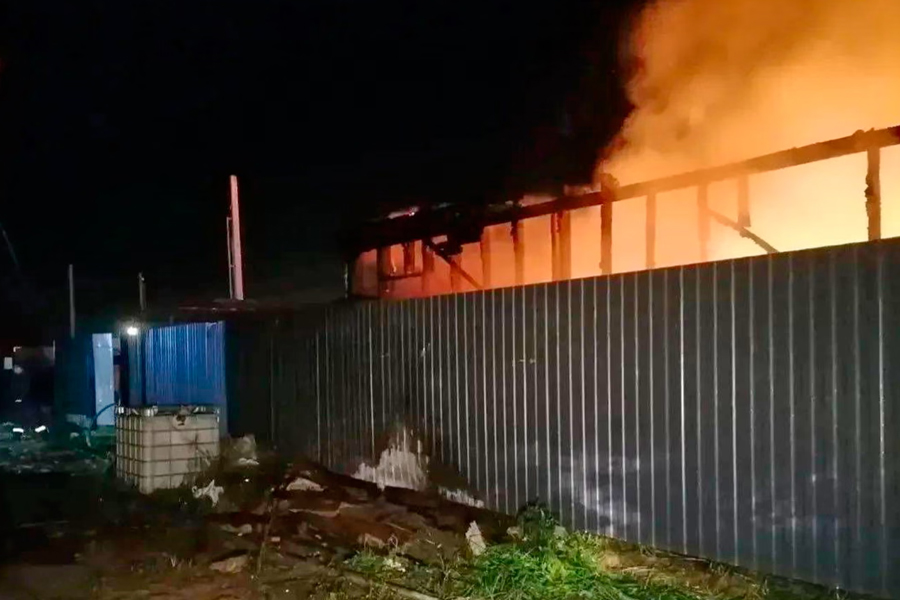Flame and smoke rise from a construction site after a Ukrainian drone attack in an undisclosed area in the Moscow region, Russia.