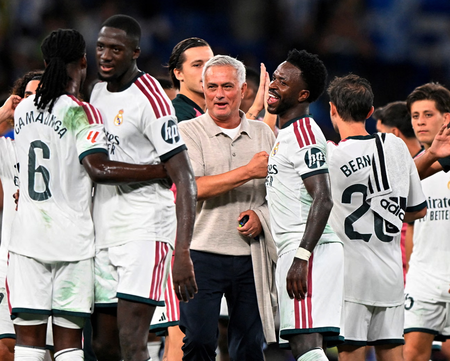 José Mourinho enjoys a giggle with Vinícius Júnior after Real's dramatic 2-1 win at Espanyol on his return to the Madrid bench.