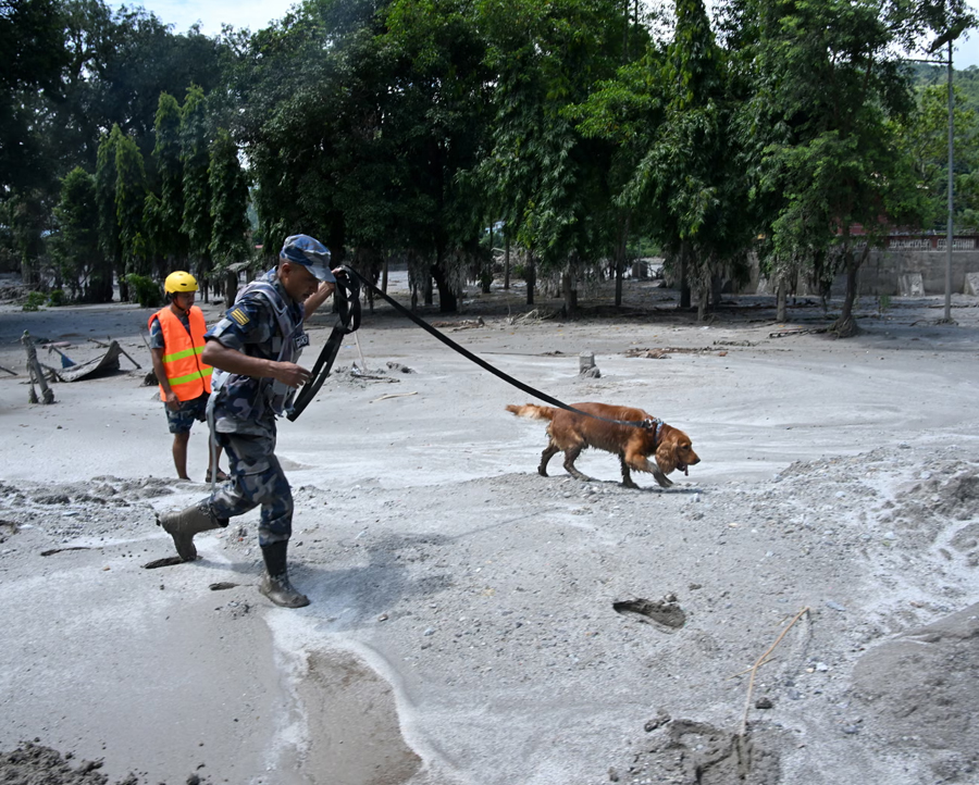 Nepal-Tibet flash flood death toll rises to 469, 1,300 missing — debris-clogged river at risk of flooding again as rescue teams race against time