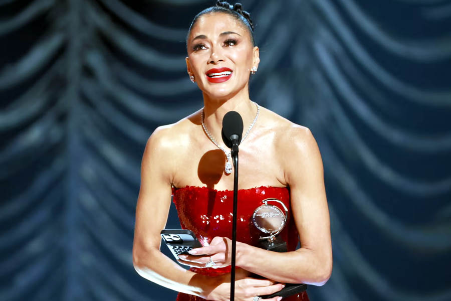 Nicole Scherzinger accepts the Tony award for best leading actress in a musical for her performance in Sunset Boulevard