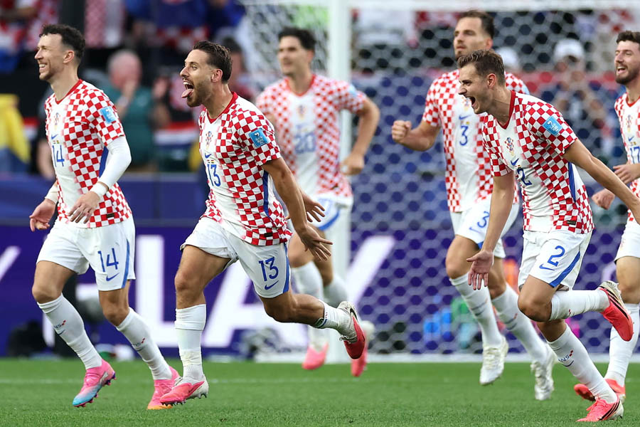 Nikola Vlasic heads Croatia back in front against Ghana in Philadelphia. The late winner secured second place for Croatia in Group L as both teams advanced to the knockout stages.