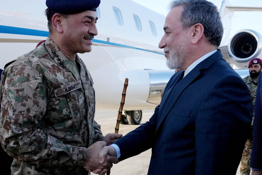 Pakistan army chief Asim Munir is welcomed by Iran's foreign minister, Abbas Araghchi, in Tehran.