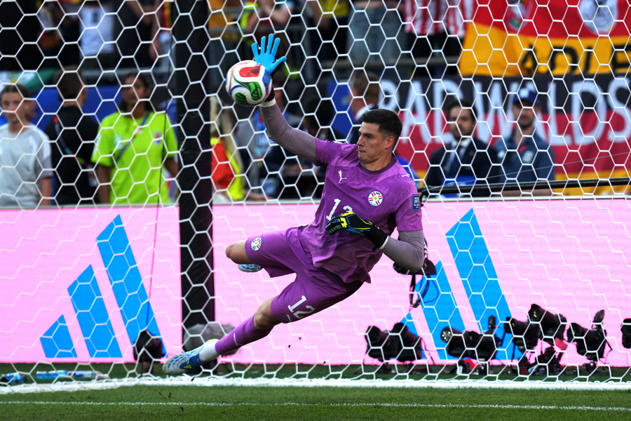 Paraguay goalkeeper Orlando Gill saves a penalty from Germany's Kai Havertz in the shoot-out. The save set the tone for Paraguay's historic 4-3 penalty victory over the four-time world champions.