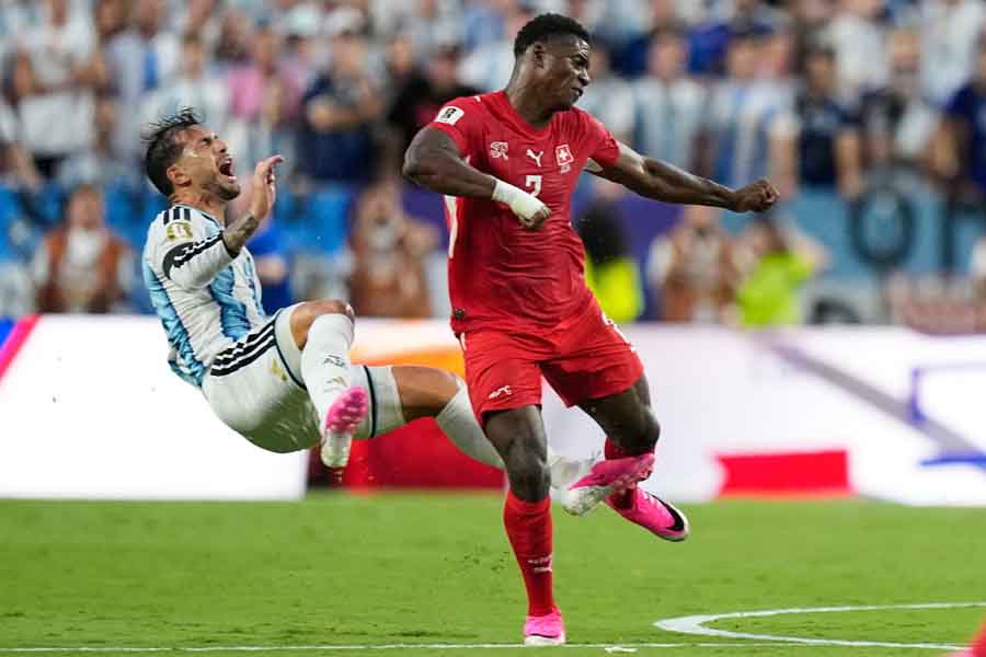 Paredes is taken down by Switzerland's Breel Embolo who receives a yellow card