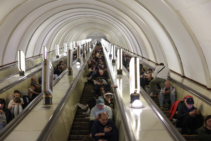People shelter in a metro station during a Russian missile attack on the Ukrainian capital on Monday, as waves of drones and missiles drove residents underground.