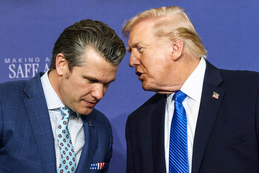 Pete Hegseth and Donald Trump together at Memphis Air National Guard Base during an official visit.