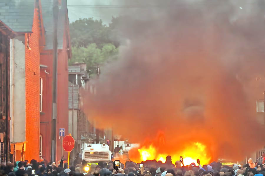 Public disorder breaks out in Northern Ireland town Ballymena after alleged sexual assault; Police in Northern Ireland say a number of missiles had been thrown towards officers and damage to properties had been reported