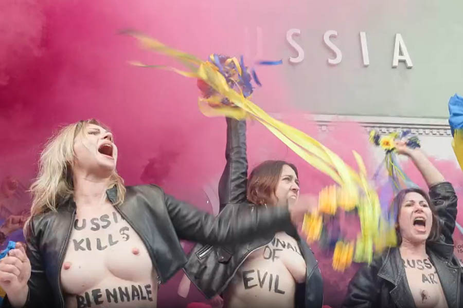 Pussy Riot stage a protest against Russia's inclusion in Venice Biennale, forcing the Russian pavilion to temporarily close.