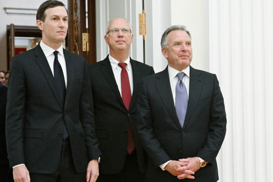 Jared Kushner, Kirill Dmitriev, and Steve Witkoff walking together inside the Kremlin to meet Vladimir Putin, following Putin’s statement that Russia is ready for war if Europe initiates conflict.