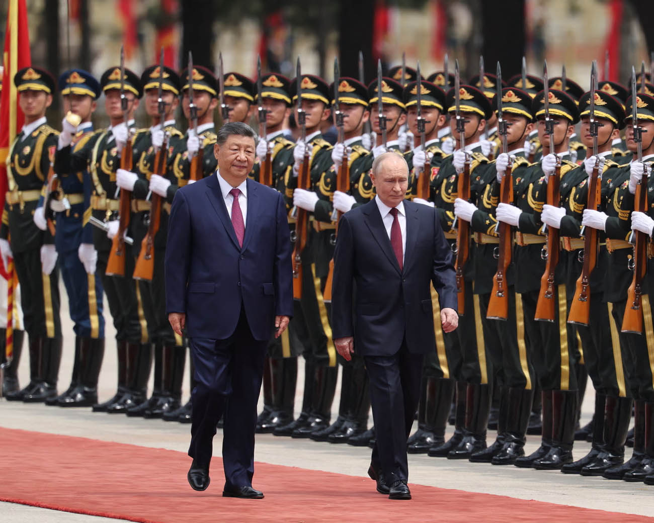 Russia’s President Vladimir Putin and China’s President Xi Jinping meet in Beijing for high-level talks on trade, security, and global politics.