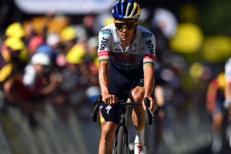 Remco Evenepoel crosses the finish line for second place on stage 10